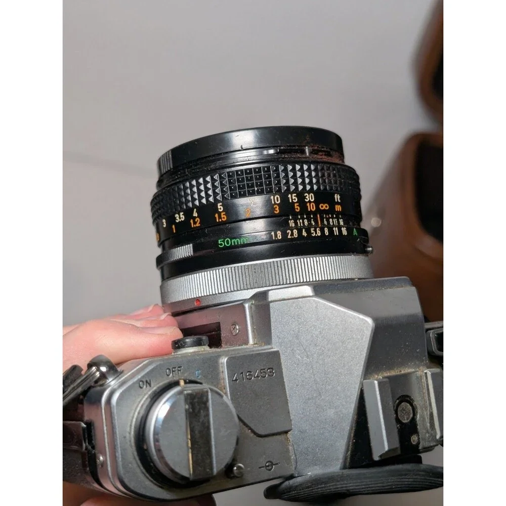 Canon AT-1 35mm Film Camera + 50mm f/1.8 Lens and Vivitar 75-205mm f/3.8 lens